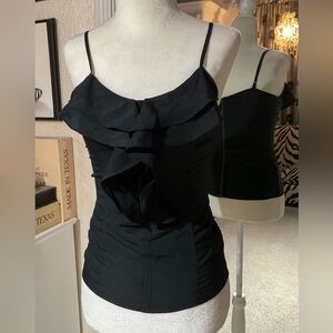 Black ruffle blouse by Miley Cirus & MaxAzria